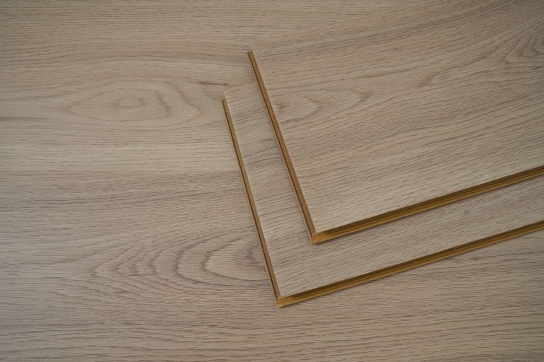 Stain-resistant laminate flooring with protective coating