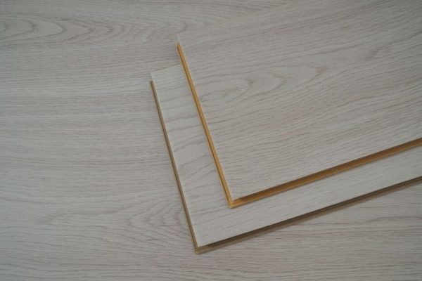 Commercial laminate flooring with wood grain texture